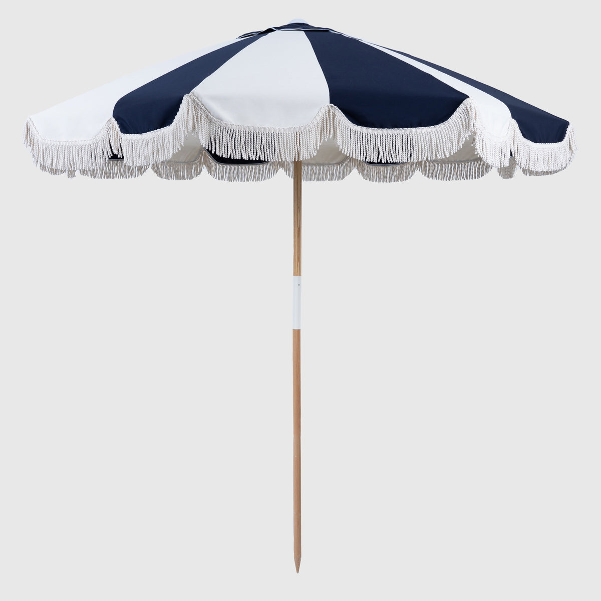 Mentari Market Umbrella in Dark Navy and oat panels with white fringe