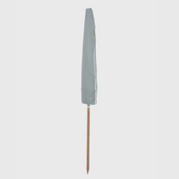 Mentari Market Umbrella in Sage packed in its free cover