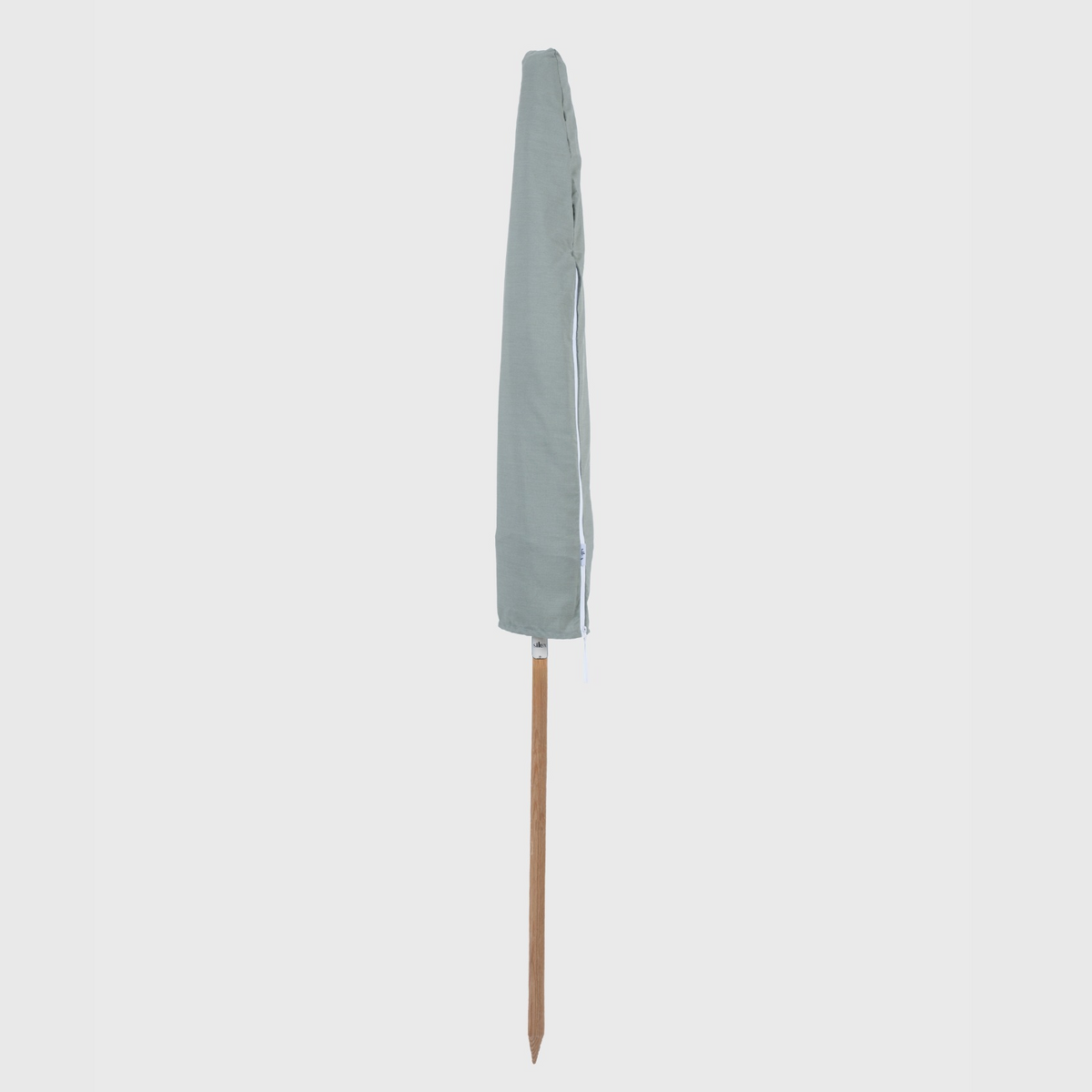 Mentari Market Umbrella in Sage packed in its free cover