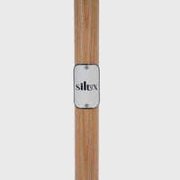 Silux badge on the Mentari Market Umbrella timber pole