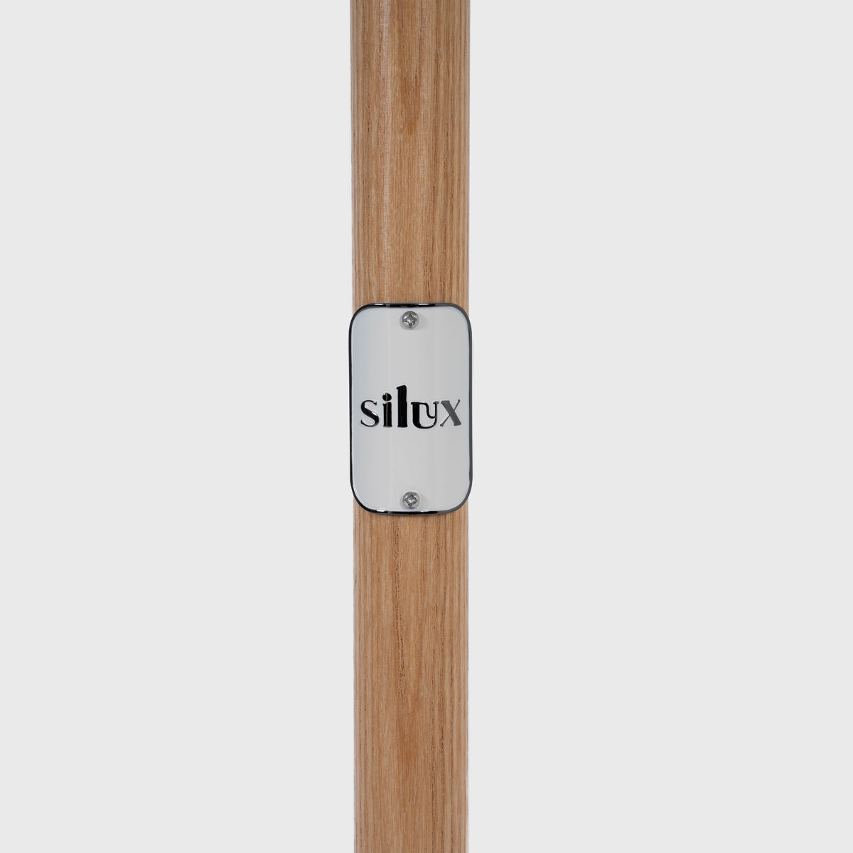 Silux badge on the Mentari Market Umbrella timber pole