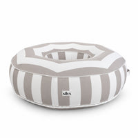 Side view of the beige and white striped Halo Float V2 with Silux tag